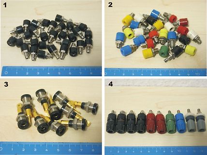 Verschiedene BNC-Adapter und Stecker auf Holzuntergrund