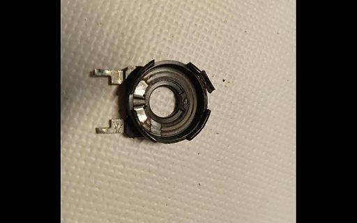 Elektronisches Bauteil, vermutlich ein Potentiometer oder Schalter
