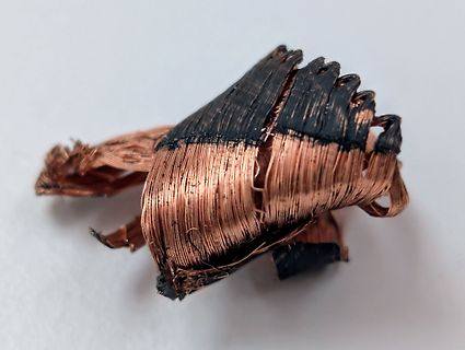 Zerkleinerte Kupferwicklungen eines Elektromotors