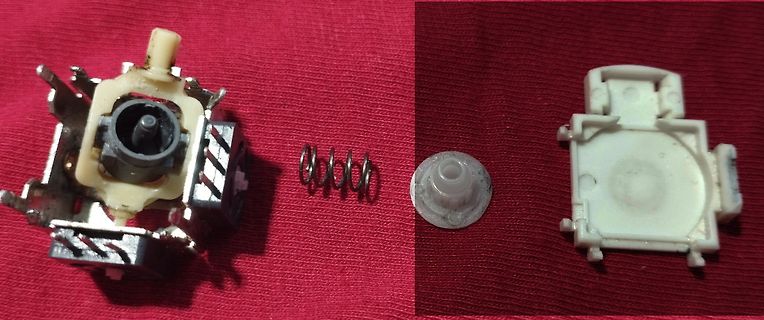 Zerlegte mechanische Tastenschalter-Komponenten