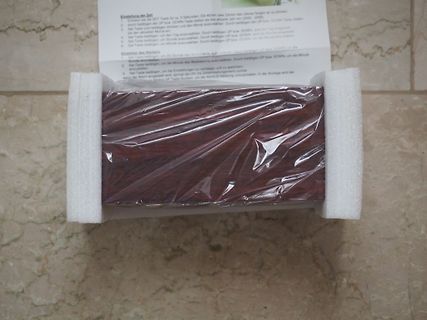 Verpacktes Gerät mit Bedienungsanleitung