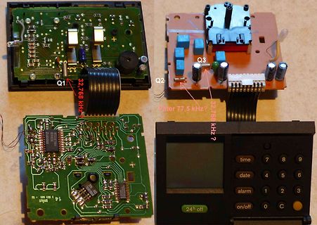 Zerlegte Elektronik mit Leiterplatten und Display
