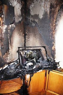 Brandgeschädigter Schaltschrank oder Gerät