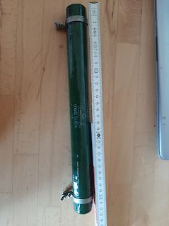 Grüner Zylinder mit Maßband