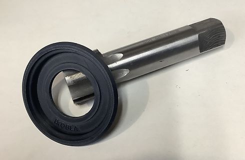 Metallischer Zylinder mit schwarzer Dichtung