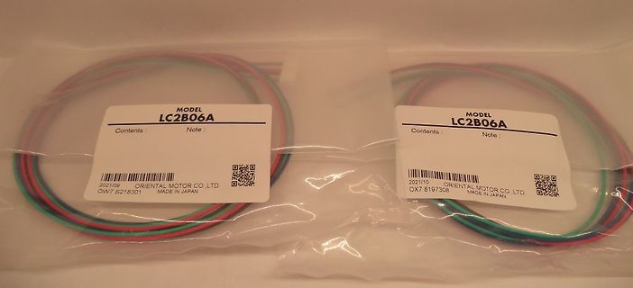 Zwei verpackte Kabelrollen von Oriental Motor