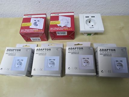 Verpackung und Inhalt von Steckdosen-Adaptern