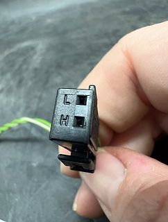Elektronikbauteil mit L und H Beschriftung
