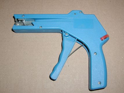Blaues Kunststoffwerkzeug mit Hebel