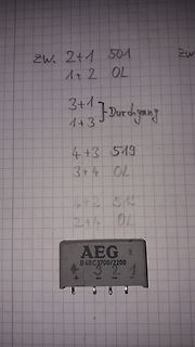 Handschriftliche Notizen und AEG Bauteil