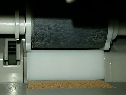 Nahaufnahme eines Walzensystems oder Druckmechanismus