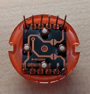 Elektronisches Bauteil in transparenter Kapselung